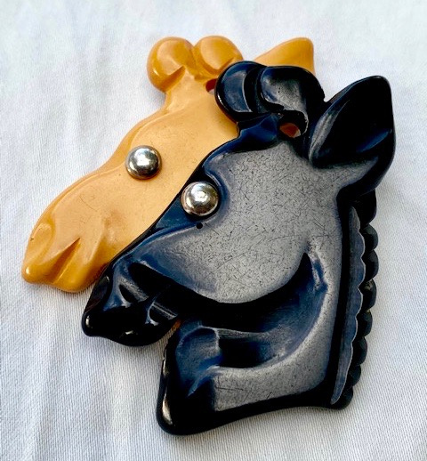 BP287 blk/cream bakelite double giraffe pin